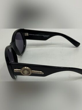 Oscar de la Renta Black Frames with Gold Medallion Accent